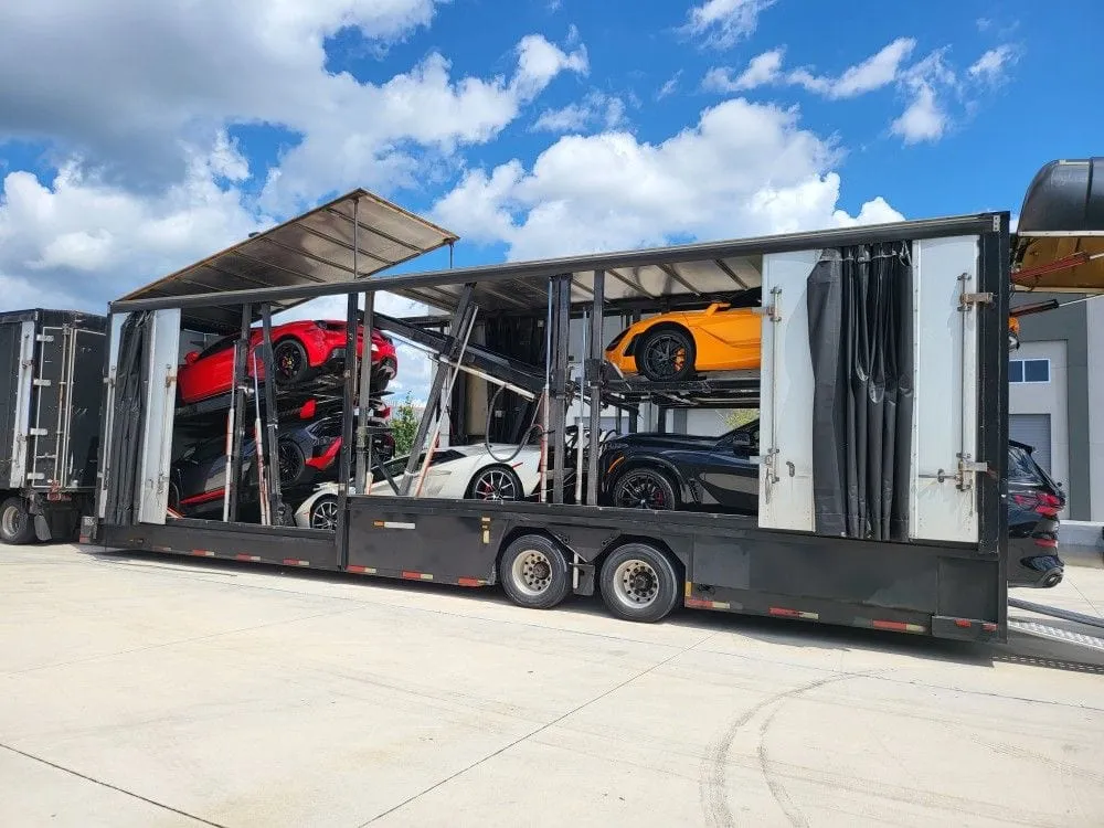 An enclosed auto-transport trailer that fully protects the vehicle inside